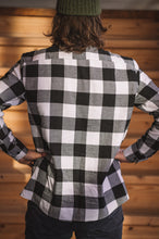 The covid hair and loose fitting flannel